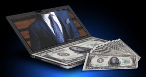 laptop and money